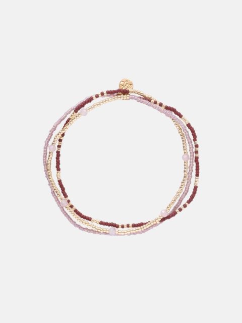 Handgemachter Schmuck aus Nepal mit Perlen in Gold, Rosa und Dunkelrot. Kleiner Anhänger